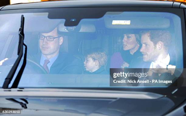 The Duke and Duchess of Cambridge, Prince Harry and Prince George arriving for the Queen's Christmas lunch at Buckingham Palace, London.