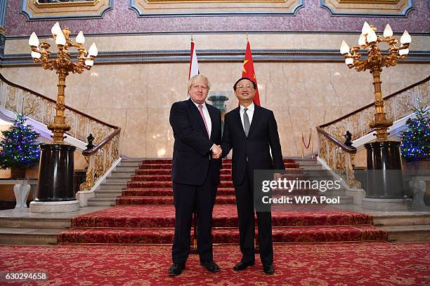 British Foreign Secretary Boris Johnson welcomes Chinese State Councillor Yang Jiechi as they meet for the UK-China Strategic Dialogue meeting on...