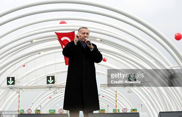 Turkish President Recep Tayyip Erdogan delivers a speech during the opening ceremony of the Eurasia Tunnel connecting Asian and European sides under...