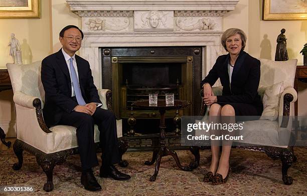 British Prime Minister Theresa May greets State Councillor of the People's Republic of China Yang Jiechi in 10 Downing Street on December 20, 2016 in...