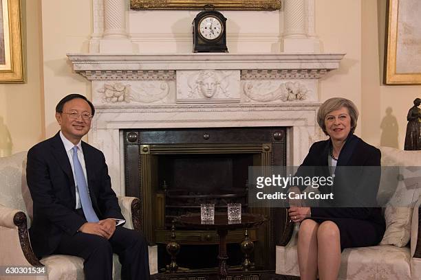 British Prime Minister Theresa May greets State Councillor of the People's Republic of China Yang Jiechi in 10 Downing Street on December 20, 2016 in...