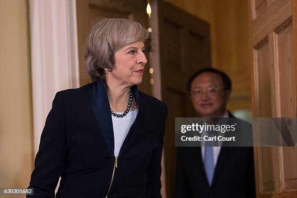 British Prime Minister Theresa May is seen as she welcomes State Councillor of the People's Republic of China Yang Jiechi in 10 Downing Street on...