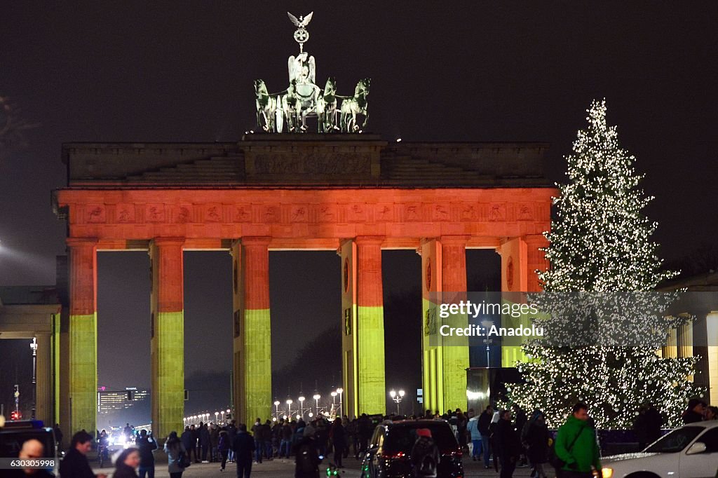The Brandenburg Gate illuminated after Christmas market attack
