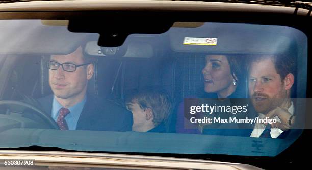 Prince William, Duke of Cambridge, Prince George of Cambridge, Catherine, Duchess of Cambridge and Prince Harry attend a Christmas lunch for members...