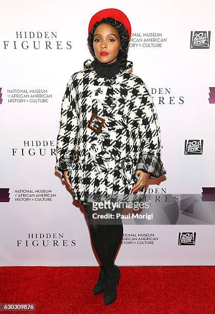Actress and musician Janelle Mone arrives at the "Hidden Figures" Washington, DC Screening at National Museum of African American History & Culture...