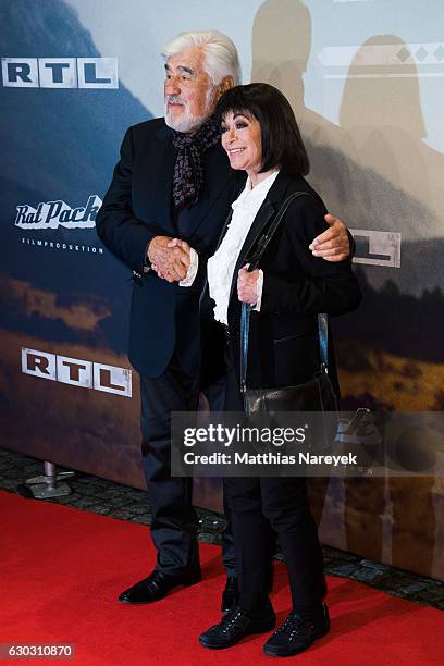 Mario Adorf and Marie Versini attend the 'Winnetou - Eine neue Welt' premiere at Delphi on December 14, 2016 in Berlin, Germany.