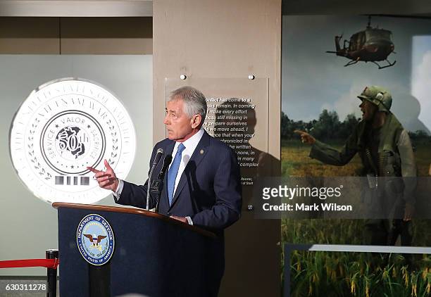 Vietnam War veteran and former Defense Secretary Chuck Hagel speaks at the unveiling of an exhibit honoring Vietnam veterans and their families, at...