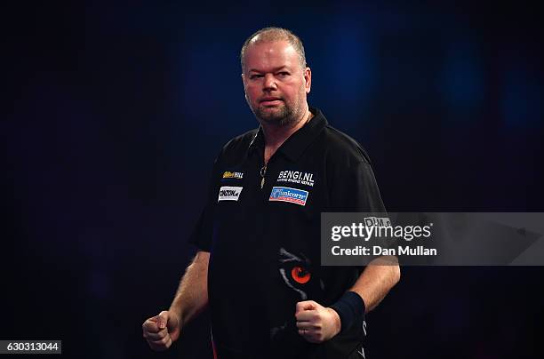 Raymond van Barneveld of the Netherlands reacts during the first round match against Robbie Green of Great Britain on day six of the 2017 William...