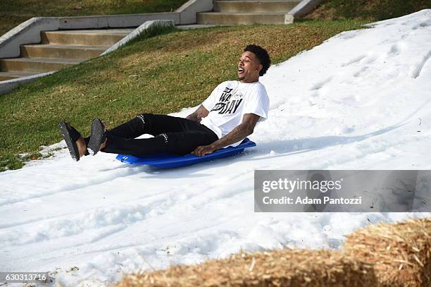 Los Angeles Lakers guard Nick Young, along with other players, coaches, and the Laker Girls hosts a holiday party for 100 kids from LAs BEST at...