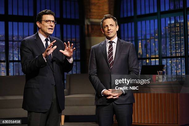 Episode 465 -- Pictured: Editor of The New Yorker, David Remnick, and host Seth Meyers during the 'Live New Yorker Cartoon' sketch on December 20,...