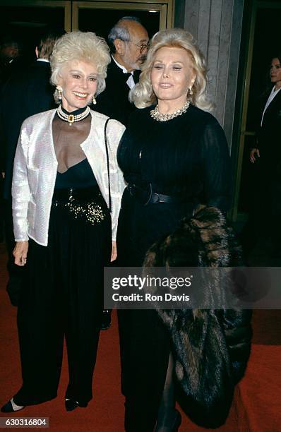 Eva Gabor and Zsa Zsa Gabor arrive during "That's Entertainment III" Westwood Premiere on April 28, 1994 at the Mann's National Theater in Westwood,...