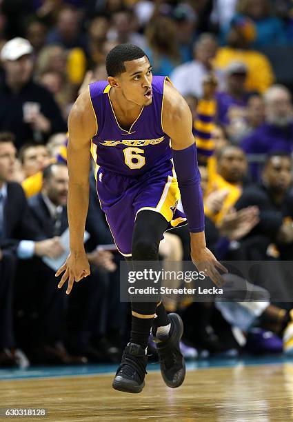 Jordan Clarkson of the Los Angeles Lakers reacts after making a shot against the Charlotte Hornets during their game at Spectrum Center on December...