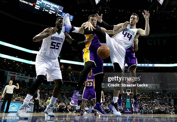 Teammates Larry Nance Jr. #7 and Brandon Ingram of the Los Angeles Lakers go after a loose ball against teammates Roy Hibbert and Frank Kaminsky III...