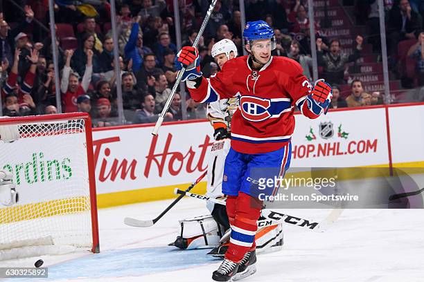 Montreal Canadiens center Brian Flynn celebrates Montreal Canadiens defenseman Jeff Petry goal during the 3rd period of the NHL regular season game...