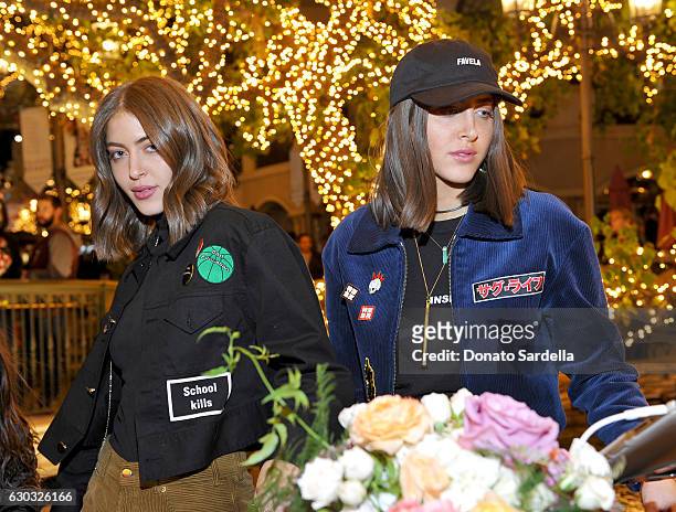 Simi Khadra and Haze Khadra of SIMIHAZE attends the opening of Laduree at The Grove in Los Angeles hosted by Rick Caruso and Jessica Alba in...