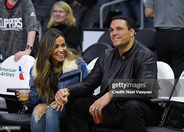 Tony Gonzalez and October Gonzalez attend a basketball game between the Denver Nuggets and the Los Angeles Clippers at Staples Center on December 20,...