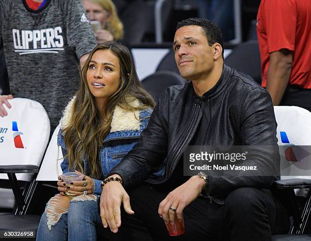 Tony Gonzalez and October Gonzalez attend a basketball game between the Denver Nuggets and the Los Angeles Clippers at Staples Center on December 20,...