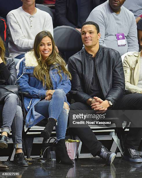 Tony Gonzalez and October Gonzalez attend a basketball game between the Denver Nuggets and the Los Angeles Clippers at Staples Center on December 20,...