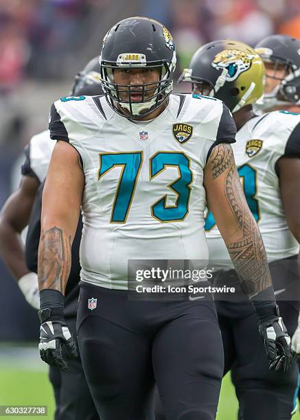 Jacksonville Jaguars offensive guard Jeremiah Poutasi enters the line of scrimmage during the NFL game between the Jacksonville Jaguars and Houston...