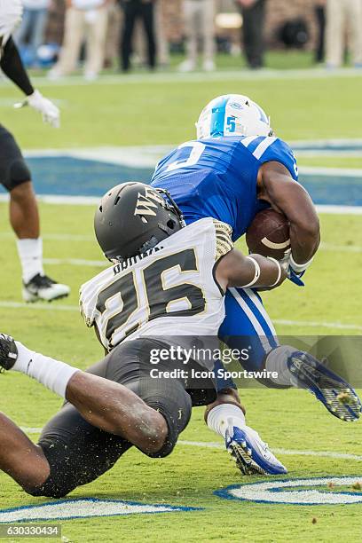 Duke Blue Devils wide receiver Johnathan Lloyd is tackled by Wake Forest Demon Deacons linebacker Thomas Brown . NCAA College Football, Wake Forest...