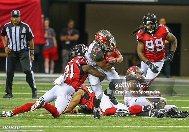 Tampa Bay Buccaneers running back Doug Martin runs the ball for a first down during the third quarter of the game between the Atlanta Falcons and the...