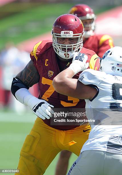 Trojans right tackle Zach Banner in action during the second quarter of a game against the Utah State Aggies played at the Los Angeles Memorial...