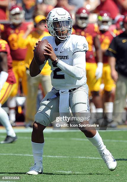 Utah State Aggies quarterback Kent Myers in action during the second quarter of a game against the USC Trojans played at the Los Angeles Memorial...