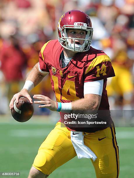 Trojans quarterback Sam Darnold on the run in the fourth quarter of a game against the Utah State Aggies played at the Los Angeles Memorial Coliseum...