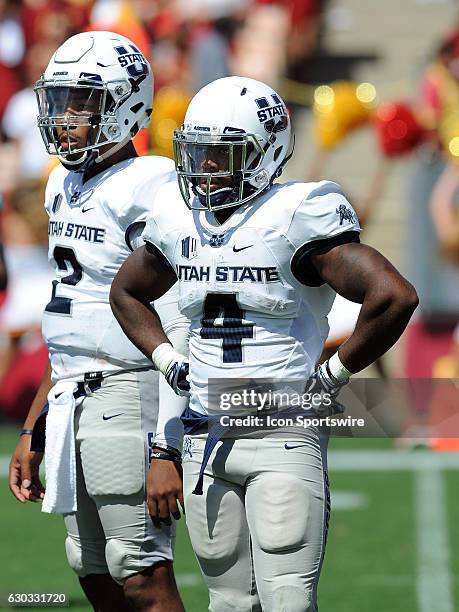 Utah State Aggies running back Tonny Lindsey and quarterback Kent Myers look towards the sidelines in the fourth quarter a game against the USC...