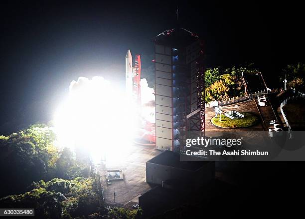 In this aerial image, the Epsilon-2 rocket carrying Exploration of energization and Radiation in Geospace satellite lifts off from the launch pad at...