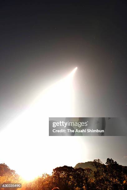 The Epsilon-2 rocket carrying Exploration of energization and Radiation in Geospace satellite lifts off from the launch pad at the Japan Aerospace...
