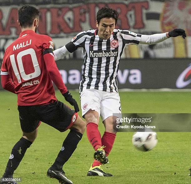 Makoto Hasebe of Eintracht Frankfurt makes a pass during the first half of the team's 3-0 win at home to Mainz in a German Bundesliga match on Dec....