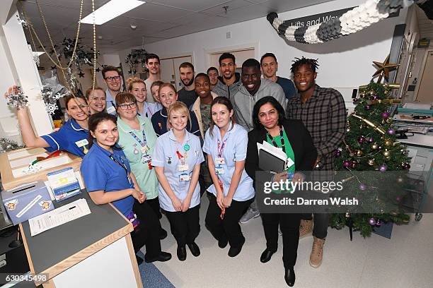 Chelsea players including Thibaut Courtois, Branislav Ivanovic, Eden Hazard, Ruben Loftus-Cheek, Kurt Zouma, Nemanja Matic and Michy Batshuayi pose...