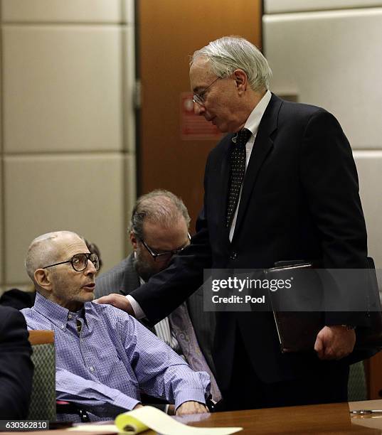 Real estate heir Robert Durst talks with attorney Donald Re appears during a preliminary hearing in the Airport Branch of the Los Angeles County...