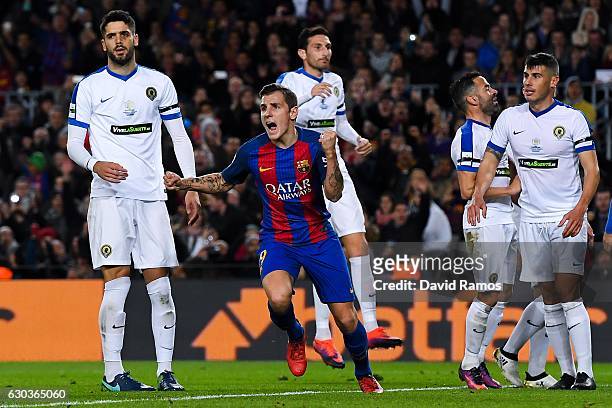 Lucas Digne of FC Barcelona celebrates after scoring his team's first goal during the Copa del Rey round of 32 second leg match between FC Barcelona...