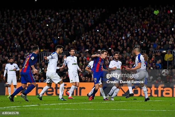 Lucas Digne of FC Barcelona scores the opening goal during the Copa del Rey round of 32 second leg match between FC Barcelona and Hercules at Camp...