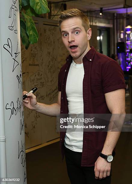 Tyler Mount signs the wall at AOL HQ when he visits for Build Presents Anthony Rapp, Tyler Mount & Christine Pedi & Playbill Discussing "Broadway...