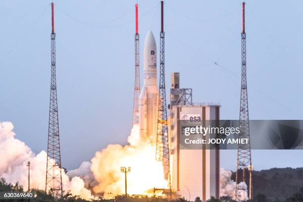 The Ariane V rocket lifts off from the European spaceport in Kourou, French Guiana on December 21, 2016 carrying onboard two satellites: the Star...