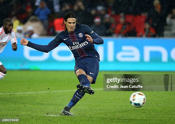 Edinson Cavani of PSG scores a goal on a penalty kick during the French Ligue 1 match between Paris Saint-Germain and FC Lorient at Parc des Princes...