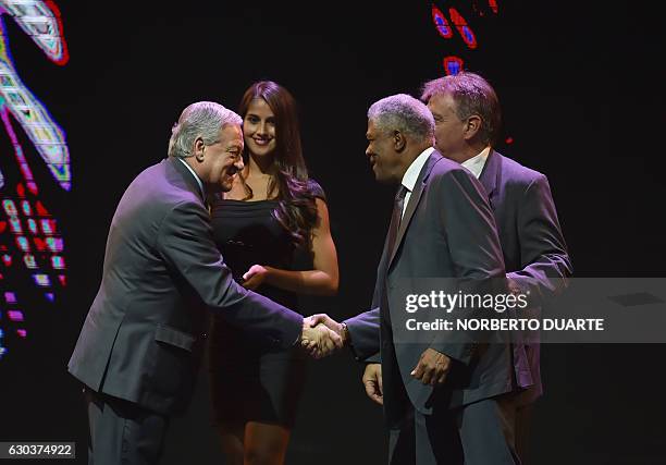 Vice President Arturo Sala greets Colombian Francisco Maturana, declared distinguished coach, during the Libertadores Cup draw in Luque, Paraguay, on...