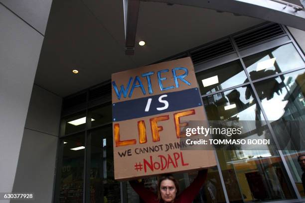 Protesters rally against Wells Fargo in solidarity with the people of Standing Rock in Hollywood, California, on December 21, 2016.