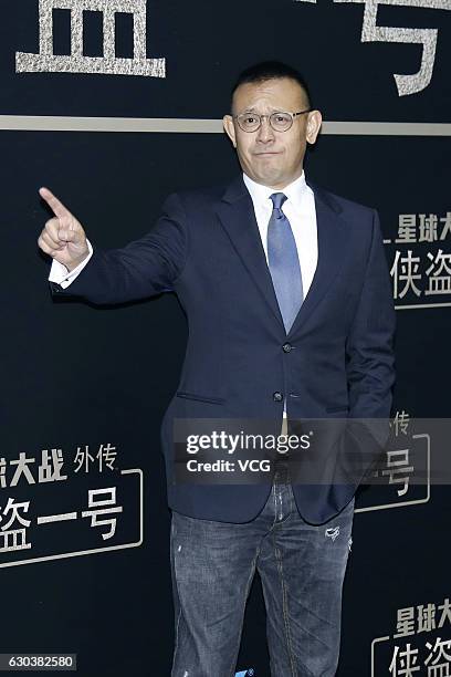 Actor Jiang Wen arrives on the red carpet for the premiere of film "Rogue One: A Star Wars Story" on December 21, 2016 in Beijing, China.