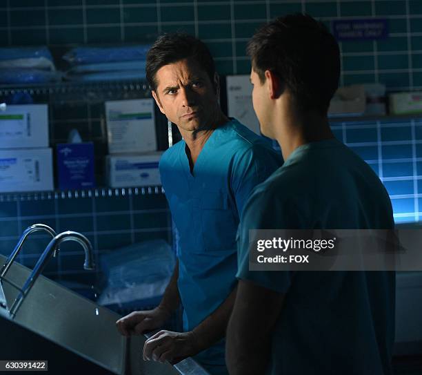 John Stamos and Taylor Lautner in the all-new THE HAND episode of SCREAM QUEENS airing Tuesday, Nov. 29 on FOX.