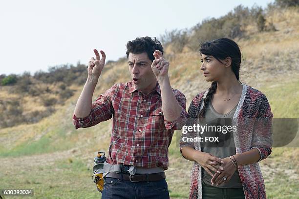 Max Greenfield and Hannah Simone in the " Africa or Retractable S'mores Pole" episode of NEW GIRL airing Tuesday, Oct. 4 on FOX.