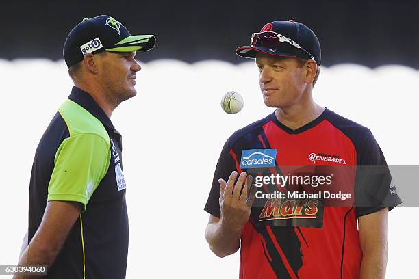 Renegades coach Andrew McDonald is seen with Clint McKay of the Renegades during the Big Bash League match between the Melbourne Renegades and Sydney...