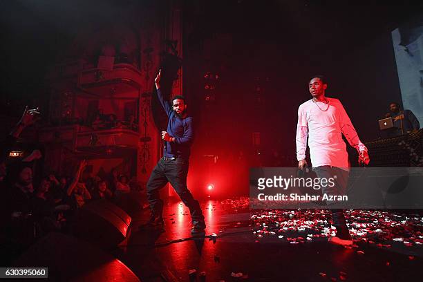 Singer yasiin bey and Pharoahe Monch perform in concert at The Apollo Theater on December 21, 2016 in New York City.