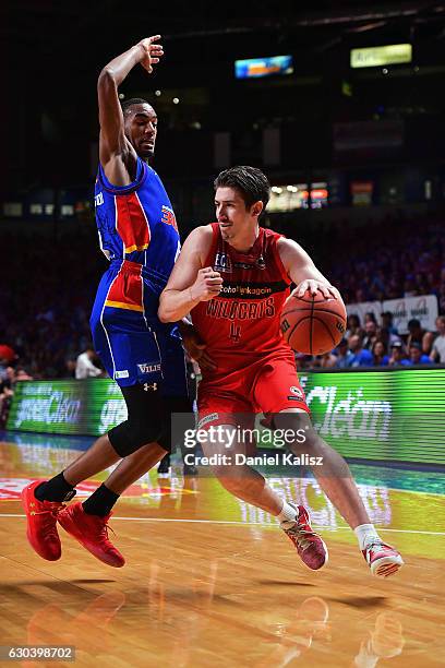 Terrance Ferguson of the Adelaide 36ers defends agains Greg Hire of the Perth Wildcats during the round 12 NBL match between the Adelaide 36ers and...