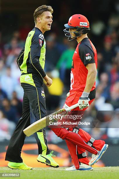 Chris Green of the Thunder celebrates the wicket of Cameron White of the Renegades during the Big Bash League match between the Melbourne Renegades...