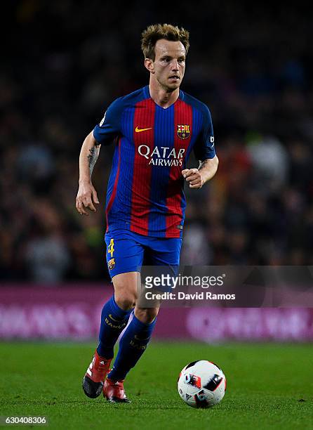 Ivan Rakitic of FC Barcelona runs with the ball during the Copa del Rey round of 32 second leg match between FC Barcelona and Hercules at Camp Nou on...