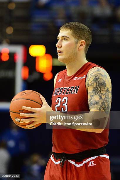 Western Kentucky Hilltoppers Forward Justin Johnson holds on to the ball during the game against the Indiana State Sycamores on December 11 at the...